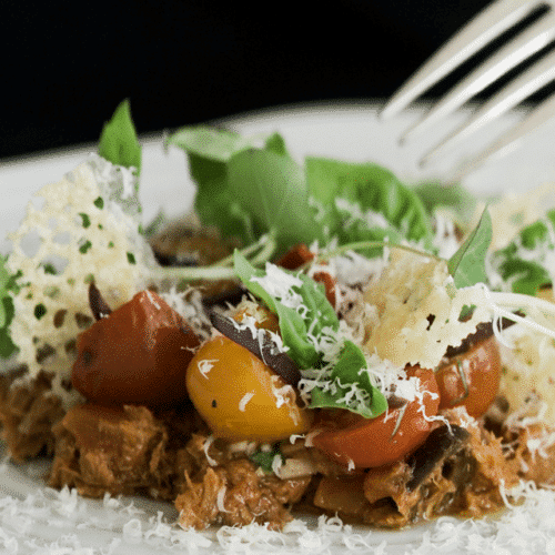 Salad with marinated tomatoes & mackerel with olives